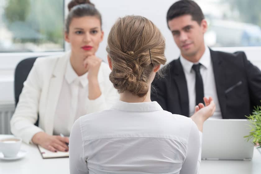 Three people holding an interview