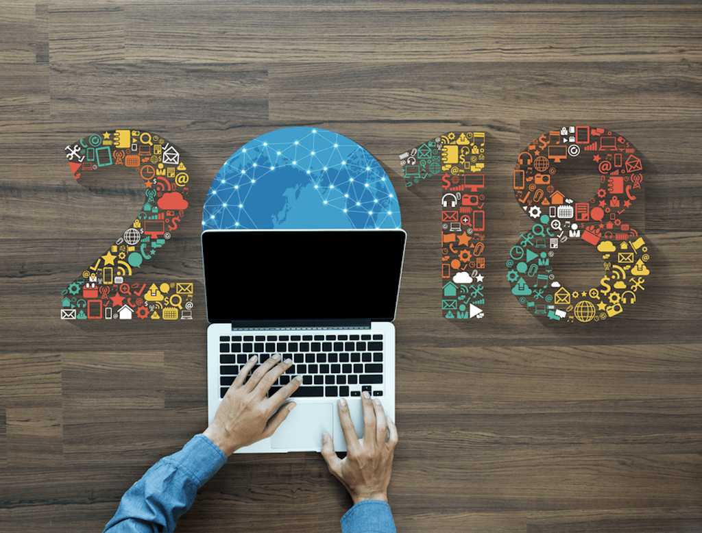Laptop on table with 2018