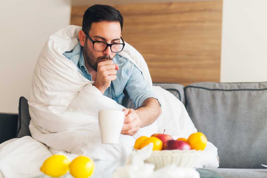 Man sick on sofa